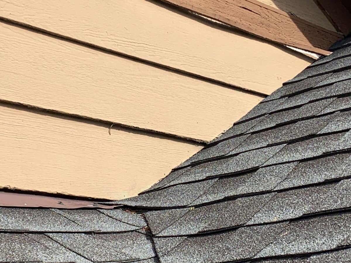 Siding in contact with roofing Buyer's Inspection Service